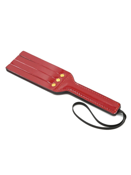 Red Glossy Faux Leather Paddle with Wrist Loop and Gold-Tone Stud Details