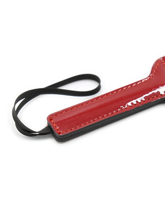 Red Glossy Faux Leather Paddle with Wrist Loop and Gold-Tone Stud Details