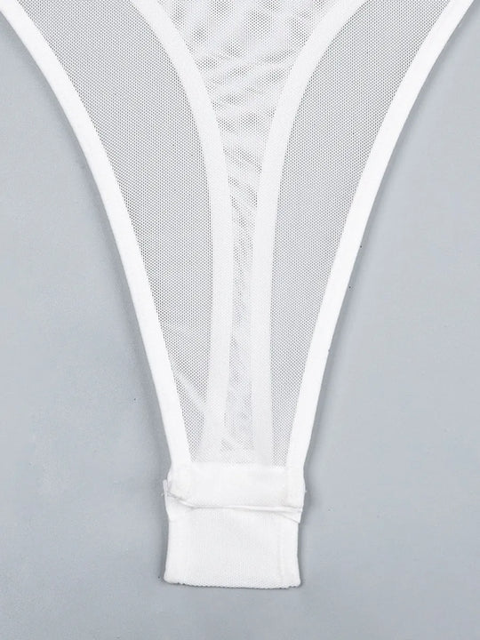 Bügel-Bodysuit für Damen aus floraler Spitze und gepunktetem Mesh mit Cage-Details und Strapsen