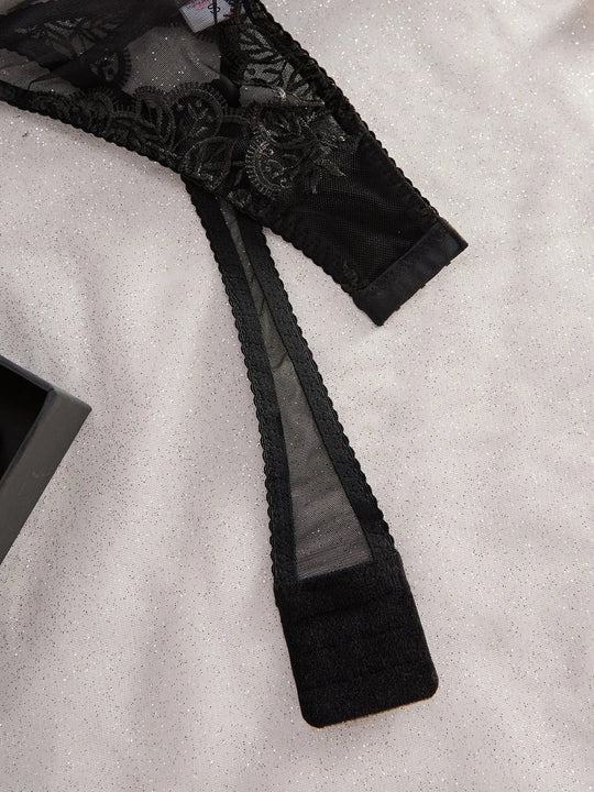 Damen-Bodysuit aus Mesh mit tiefem Ausschnitt und Bügeln, Spitzenbesatz und Bindeträgern an den Schultern
